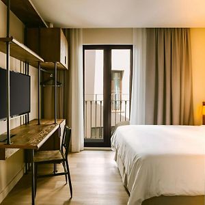 Kamer met een Queen Size Bed